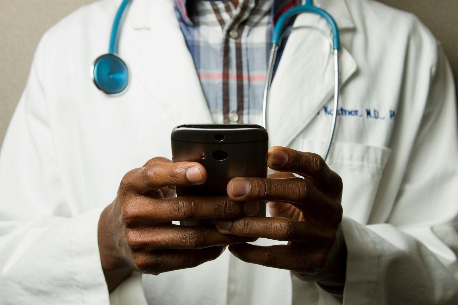 A stethoscope resting on a desk